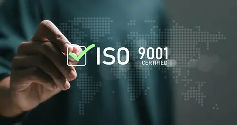 Hand selecting ISO 9001 certified quality management system icon